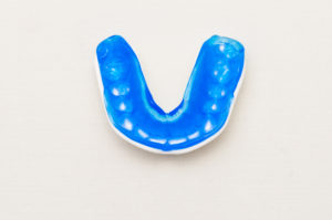 Blue and white mouth guard.