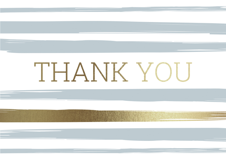 Closeup of a greeting card with gold and gray colored stripes and the words thank you written in gold.