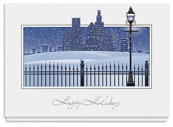 A cityscape presented in varying tones of blue with the words 'Happy Holidays' written underneath.