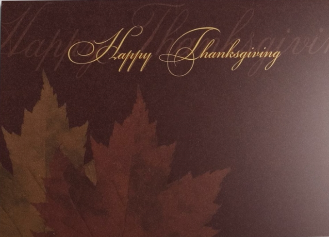 This greeting card offers a classically stylish way to send Thanksgiving wishes. The duel leaf design in autumn colors against a brown-burgundy background combines with a simple message of ‘Happy Thanksgiving’ in a gold script.