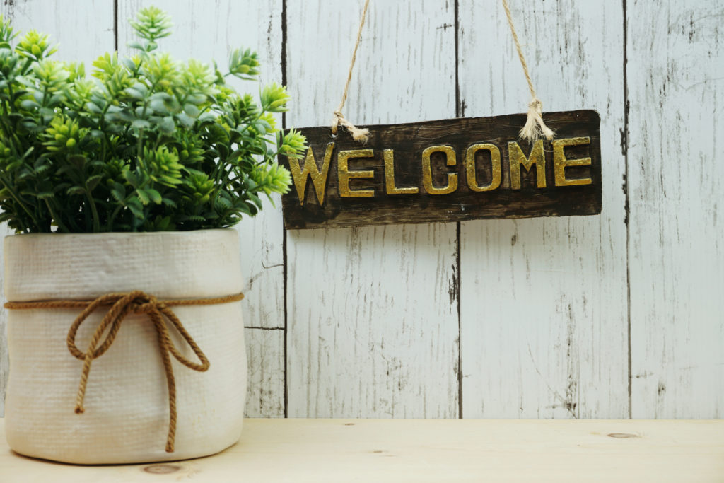 Welcome sign and home decor with space copy background